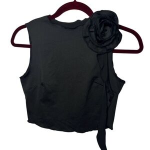 Black Sleeveless Top with Rosette Accent